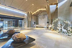 Vstupní hala nebo recepce v ubytování The Mulian Urban Resort Hotels Huadu + 284 fotografií
