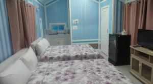 Postel nebo postele na pokoji v ubytování Nam Khong Tara Resort + 159 fotografií