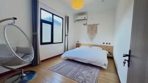 Beijing Meet the Mountain Boutique Guesthouse客房内的一张或多张床位