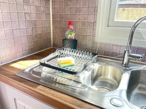 Η κουζίνα ή μικρή κουζίνα στο Cosy Central Cambridge Apartment's +77 φωτογραφίες
