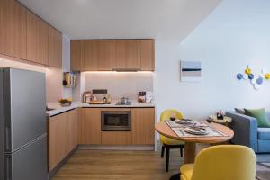 Virtuve vai virtuves zona naktsmītnē Citadines Gaoke Liangjiang Chongqing