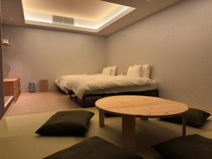 Postel nebo postele na pokoji v ubytování suirow 翠楼 + 31 fotografií