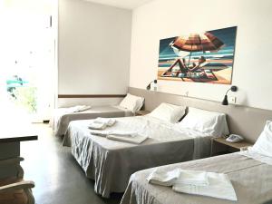 Postel nebo postele na pokoji v ubytování Hotel Internazionale