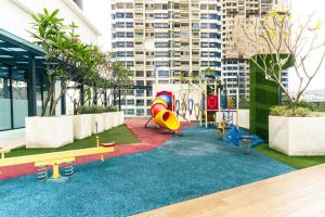 Area giochi per bambini di Reizz Residence By Nexus Suites