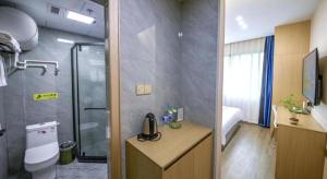Koupelna v ubytování Yiwu Bairui Grand Hotel