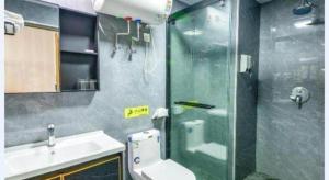 Koupelna v ubytování Yiwu Bairui Grand Hotel