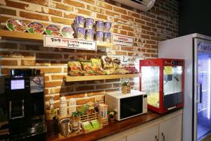 Kuchyň nebo kuchyňský kout v ubytování Hotel Look