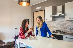 A kitchen or kitchenette at Guest House Roma Express