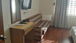 TV a/nebo společenská místnost v ubytování Hotel Berlin