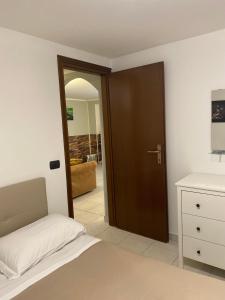 Ένα ή περισσότερα κρεβάτια σε δωμάτιο στο Bellagio Little Apartment