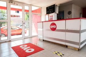 a fast food restaurant with a stop sign on the counter at OYO La Casita in Quinceo