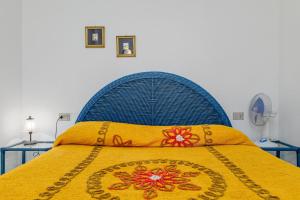 Postel nebo postele na pokoji v ubytování Trilo Deledda