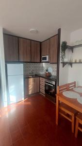 Kuchyň nebo kuchyňský kout v ubytování Apartamento Juan
