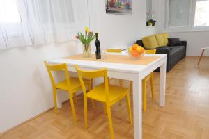 Posedenie v ubytovaní Amaros Apartment