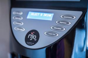 a close up of a remote control in a machine at Chester Apartments in Chester