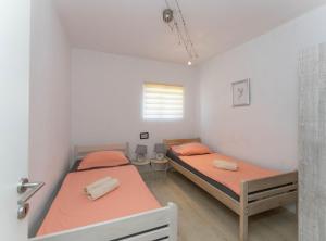 Ένα ή περισσότερα κρεβάτια σε δωμάτιο στο Holiday Home Sanda