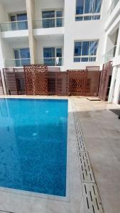 Piscina di Luxury 1BHK with Balcony - Muscat Hills o nelle vicinanze