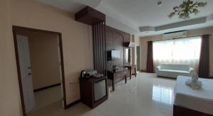 Kuchyň nebo kuchyňský kout v ubytování Le Parc Wangnang Hotel