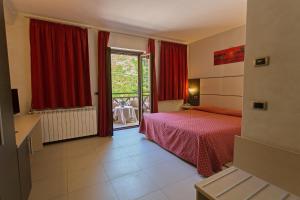 Postel nebo postele na pokoji v ubytování Albergo della Posta + 37 fotografií