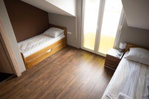 Postel nebo postele na pokoji v ubytování Z-Complex