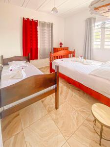 Ένα ή περισσότερα κρεβάτια σε δωμάτιο στο Villa Eruptif - Proche Volcan - 15pers - By Sister Home