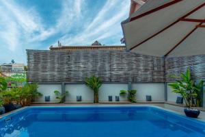 Bazén v ubytování Lemongrass & Ginger Hotel nebo v jeho okolí