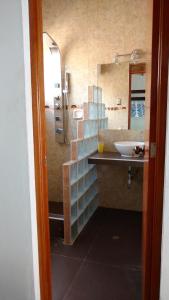 a bathroom with a sink and a shower at Bella Vista condominio in Canoas De Punta Sal +31 photos