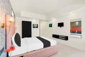 Letto o letti in una camera di Collection O Mysore Central