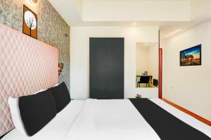 Letto o letti in una camera di Collection O Mysore Central