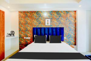 Letto o letti in una camera di Collection O Mysore Central