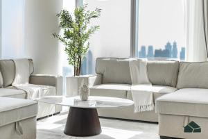 Zona de estar de High Floor 2BR with Full Burj View by BMS