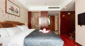 Chonpines Hotel Beijing Daxing Airport Caoqiao Metro Station客房内的一张或多张床位