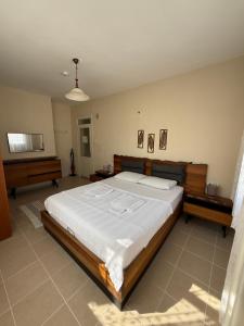 Postel nebo postele na pokoji v ubytování Idil Apart-Datça