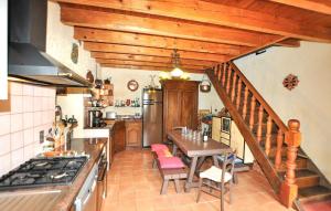 Kuchyň nebo kuchyňský kout v ubytování Maison Paisible Montagne