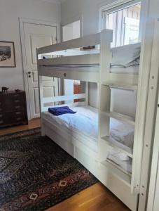a white bunk bed in a room at Uddevalla B&B in Uddevalla