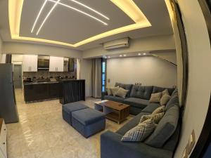 a living room with a couch and a table at villa 100C A2 in Sharm El Sheikh