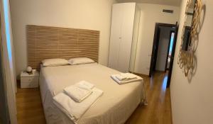 Postel nebo postele na pokoji v ubytování Villa Eribis