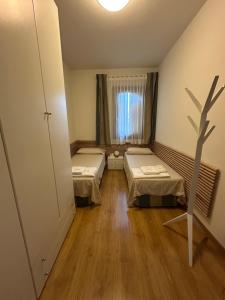 Postel nebo postele na pokoji v ubytování Villa Eribis