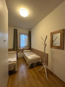 Postel nebo postele na pokoji v ubytování Villa Eribis