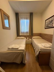Postel nebo postele na pokoji v ubytování Villa Eribis
