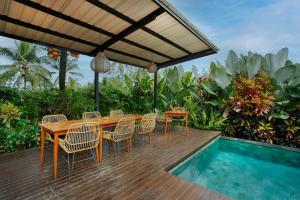 Bazén v ubytování Villa Tegal Tis Ubud nebo v jeho okolí