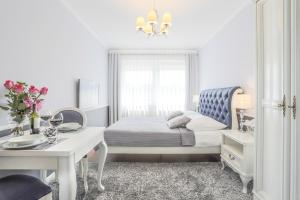 Posteľ alebo postele v izbe v ubytovaní Baltic Villa + 8 fotografií