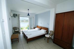 Katil atau katil-katil dalam bilik di Villa Ariadni