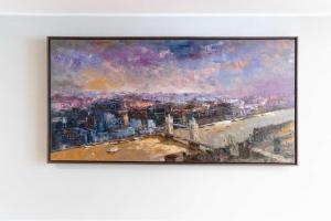 a painting of a view of a city at London Hotel in Macau