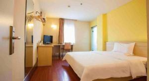Katil atau katil-katil dalam bilik di 7 Days Inn Baoding Railway Station