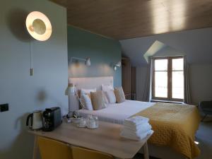 Postel nebo postele na pokoji v ubytování B&B Entre Champs