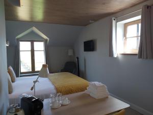 Postel nebo postele na pokoji v ubytování B&B Entre Champs