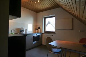 Kuchyň nebo kuchyňský kout v ubytování Gästehaus Perlmuschel