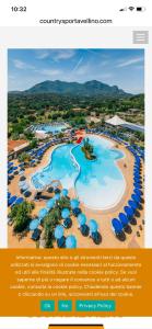 an aerial view of a resort pool with umbrellas at Kalimèra B&B in Capriglia