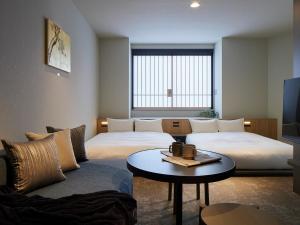 Minn Nihonbashi Suitengumae 객실 침대